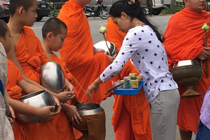 4 highlights: Sticky Waterfall/Elephants/local market /Wat Banden - Sticky Waterfalls: fun, slippery walking, and Thai massage-style bathing