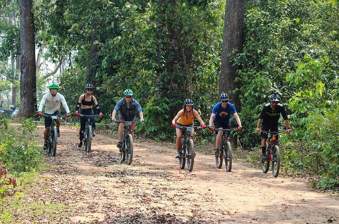 Buffalo Soldier Trail Mountain Biking Tour from Chiang Mai with Lunch - Riding schedule in the rainforest: climbs, steeper sections, and hike-and-bike reality