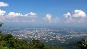 Chiang Mai: Doi Suthep and Hmong Village Half-Day Tour - Wat Phra That Doi Suthep: Legends, Relics, and the 306 Steps vs Tram Choice