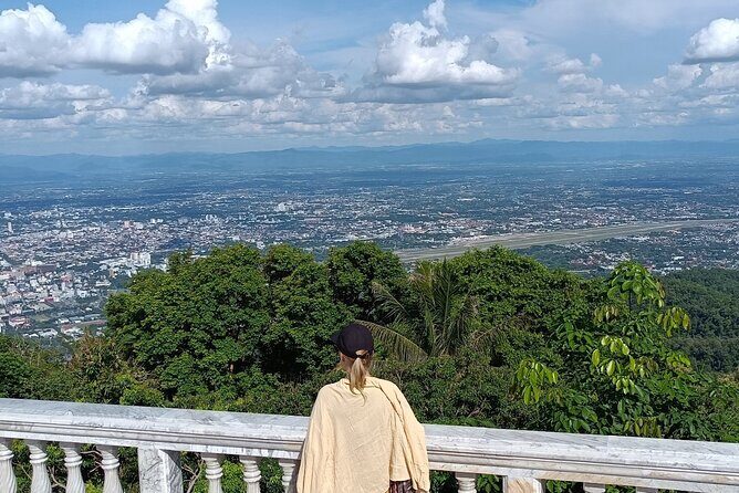 Doi Suthep Temple Tour by Local Red Car 3 Hour Adventure - Inside Wat Phra That: staircase, Naga serpents, and golden details