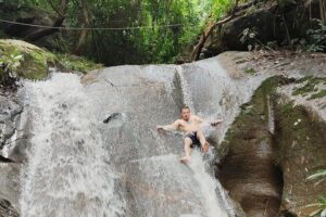 Elephant Experience and Hidden Jungle Waterfall Chiang Mai - Stop 2: Mae Taeng waterfall time, swim options, and the rock-slide fun factor