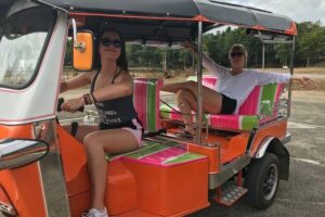 Full-Day Guided Tuk Tuk Chiang Mai Adventure and Rafting - Mountainside temple visit: monks at work, not a staged show