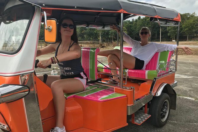 Full-Day Guided Tuk Tuk Chiang Mai Adventure and Rafting - Mountainside temple visit: monks at work, not a staged show